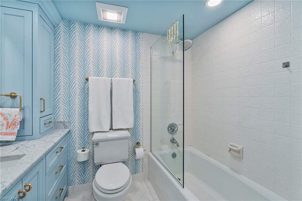 176 South Collier Boulevard, Unit 101 Marco Island, FL 34145 - Photo 31 of 50 a bathroom with a toilet and a shower