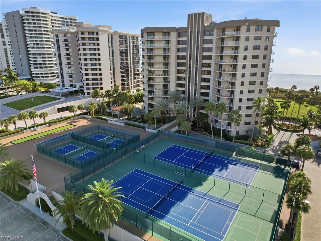 176 South Collier Boulevard, Unit 101 Marco Island, FL 34145 - Photo 43 of 50 a view of swimming pool with outdoor seating