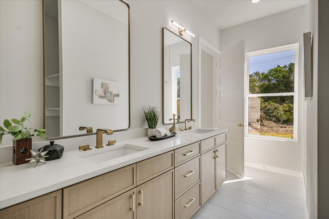 52 War Bonnet Wimberley, TX 78676 - Photo 15 of 31 a bathroom with a sink and a mirror
