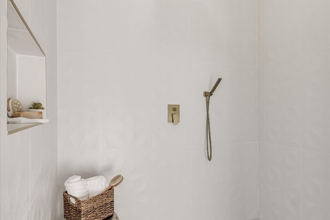 52 War Bonnet Wimberley, TX 78676 - Photo 16 of 31 a bathroom with a shower