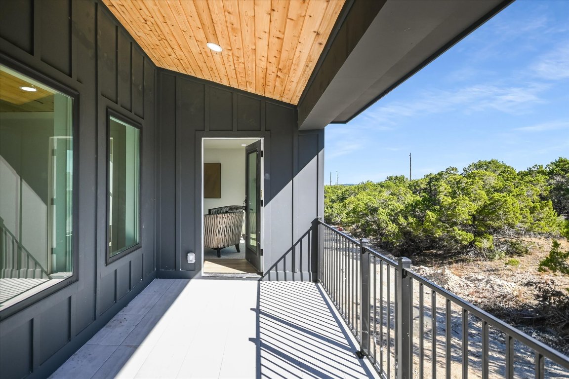 52 War Bonnet Wimberley, TX 78676 - Photo 26 of 31 a view of balcony and wooden floor