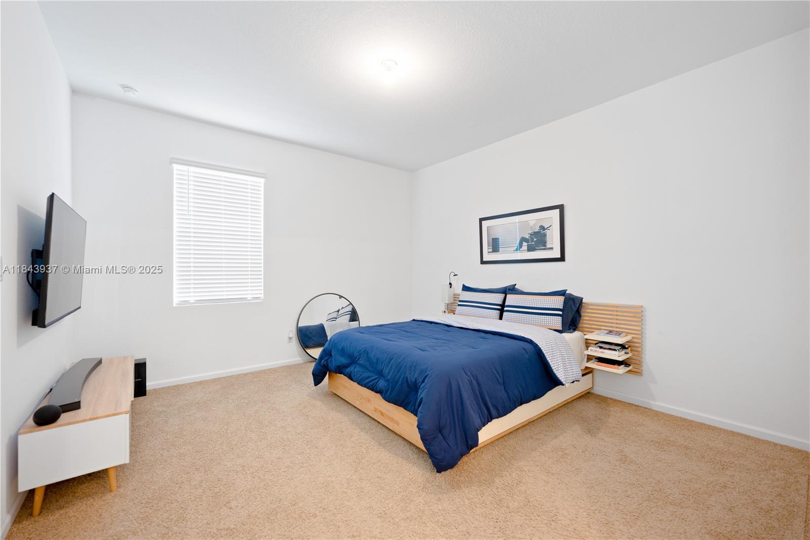 1106 Northwest 40th Terrace Lauderhill, FL 33313 - Photo 13 of 20 a living room with furniture and a flat screen tv