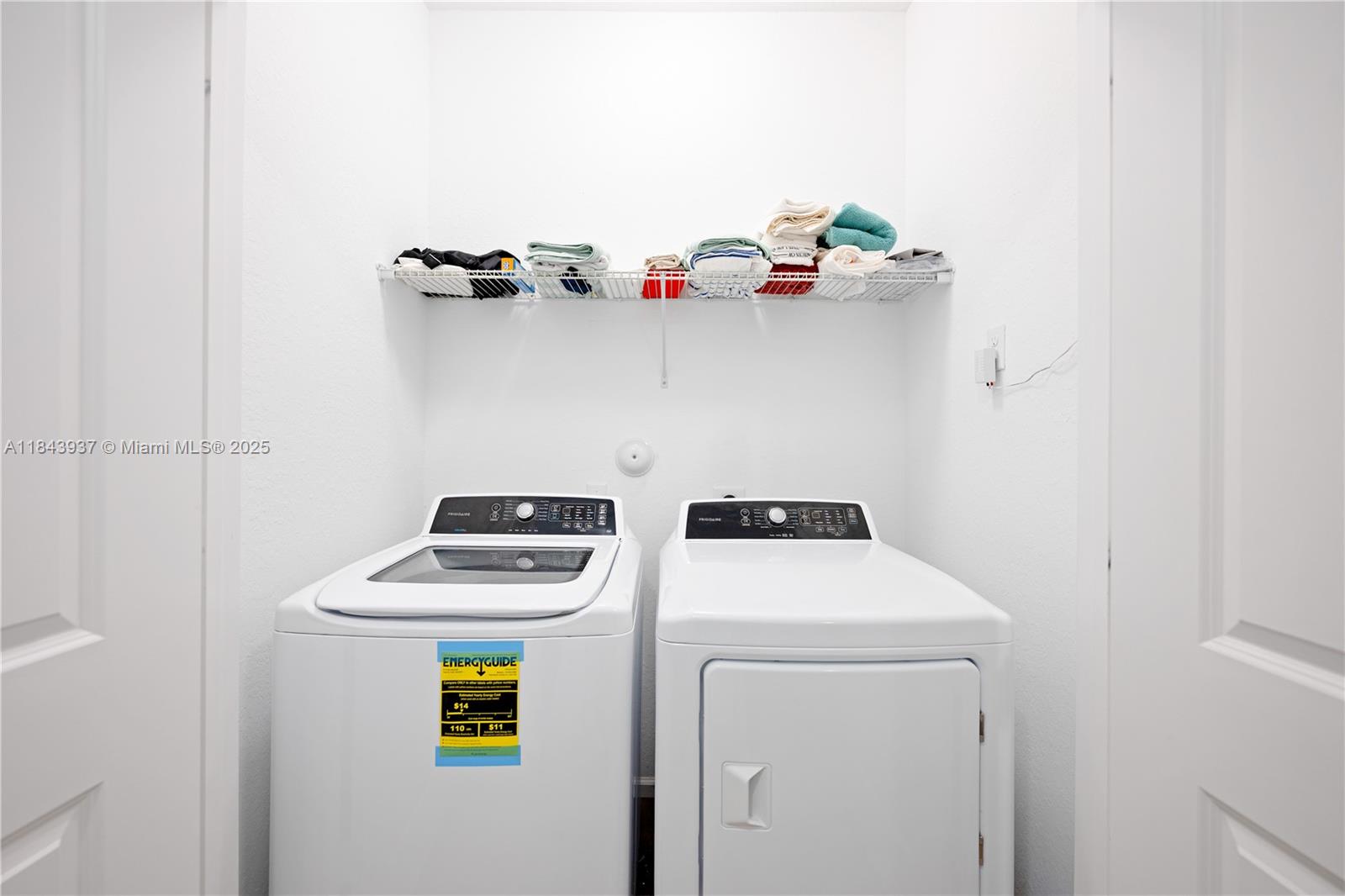 1106 Northwest 40th Terrace Lauderhill, FL 33313 - Photo 9 of 20 a utility room with dryer and washer