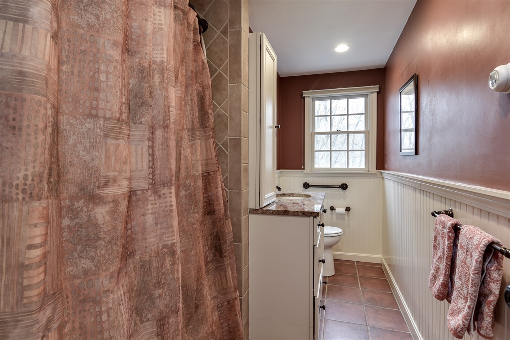 3 Swanson Road Framingham, MA 01701 - Photo 19 of 38 a bathroom with shower curtain and a sink