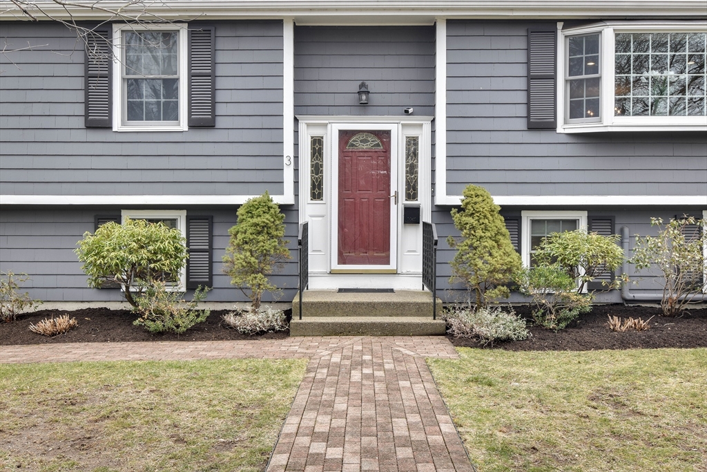 3 Swanson Road Framingham, MA 01701 - Photo 2 of 38 a front view of a house with a yard