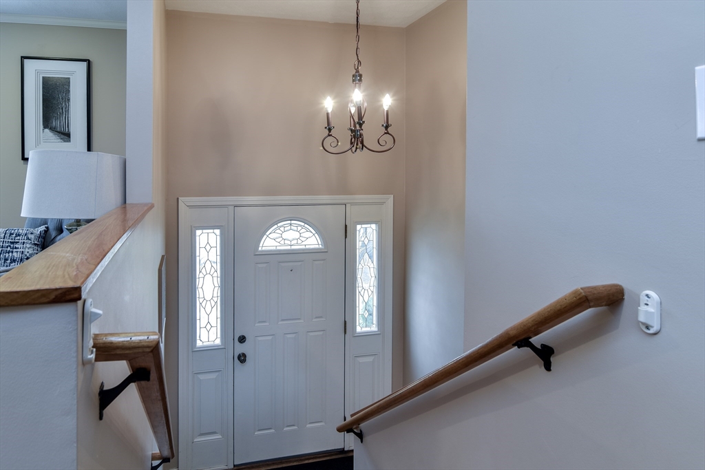 3 Swanson Road Framingham, MA 01701 - Photo 21 of 38 a view of a hallway with windows