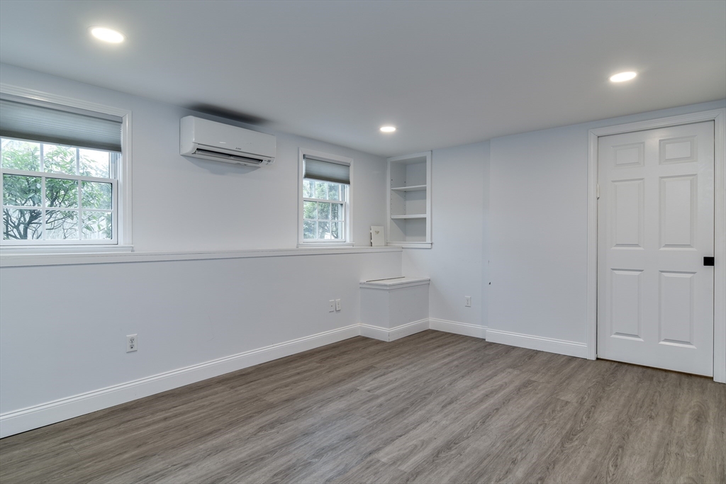 3 Swanson Road Framingham, MA 01701 - Photo 24 of 38 a view of empty room with wooden floor and fan