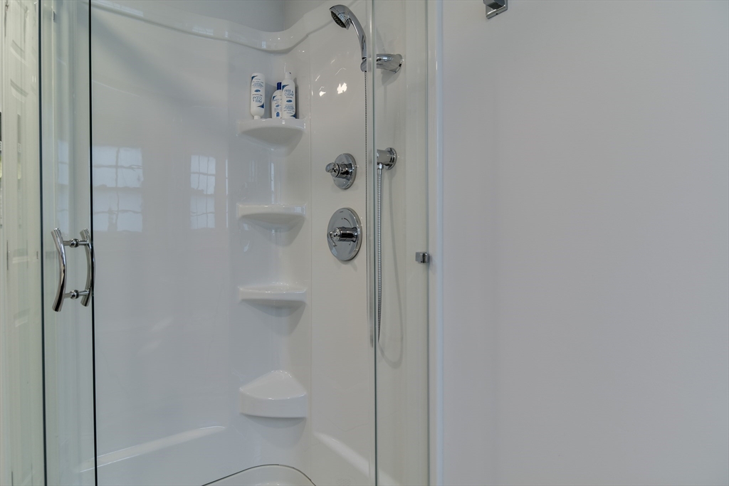 3 Swanson Road Framingham, MA 01701 - Photo 26 of 38 a bathroom with a shower and toilet