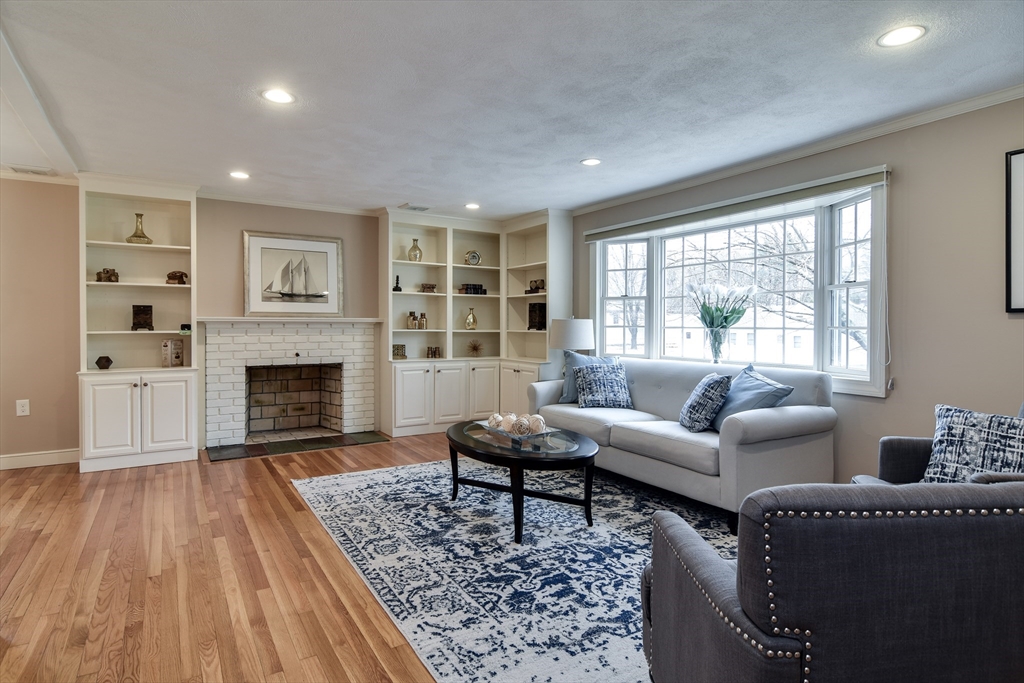3 Swanson Road Framingham, MA 01701 - Photo 3 of 38 a living room with furniture or fireplace and a wooden floor