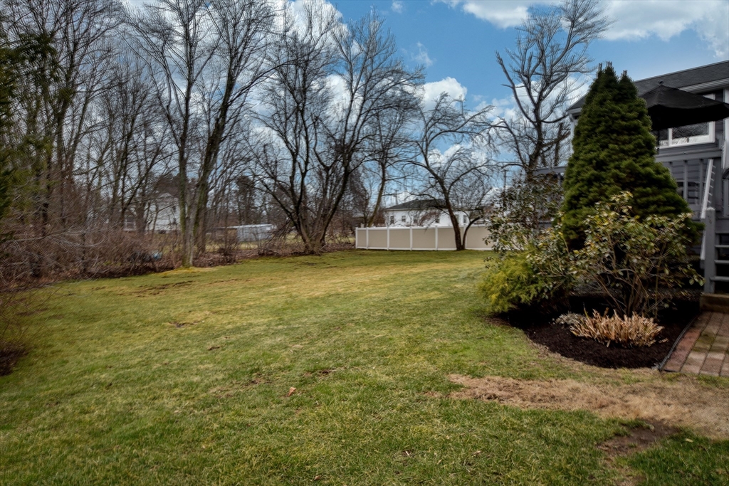 3 Swanson Road Framingham, MA 01701 - Photo 31 of 38 a view of a backyard with large trees