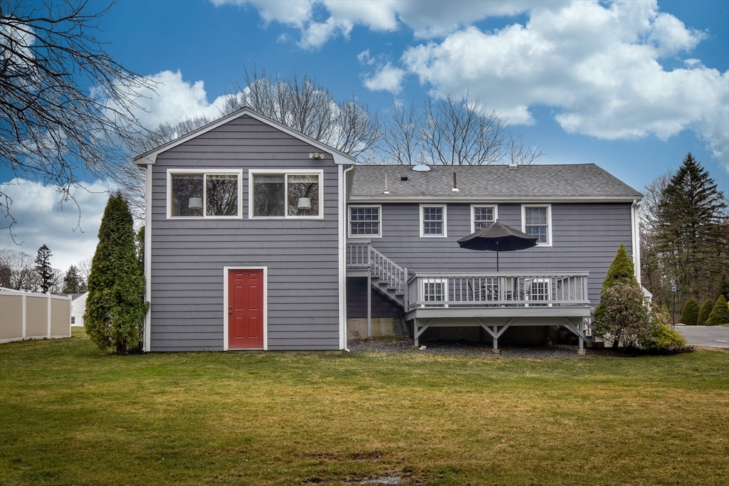3 Swanson Road Framingham, MA 01701 - Photo 34 of 38 a front view of a house with a garden