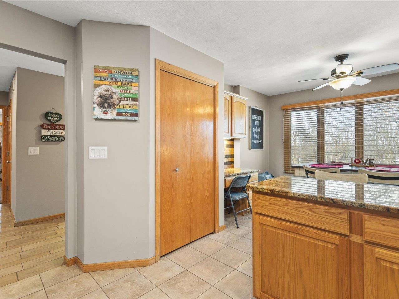 968 Falcon Point Place Rockton, IL 61072 - Photo 13 of 38 a dining hall with stainless steel appliances granite countertop a refrigerator and a sink