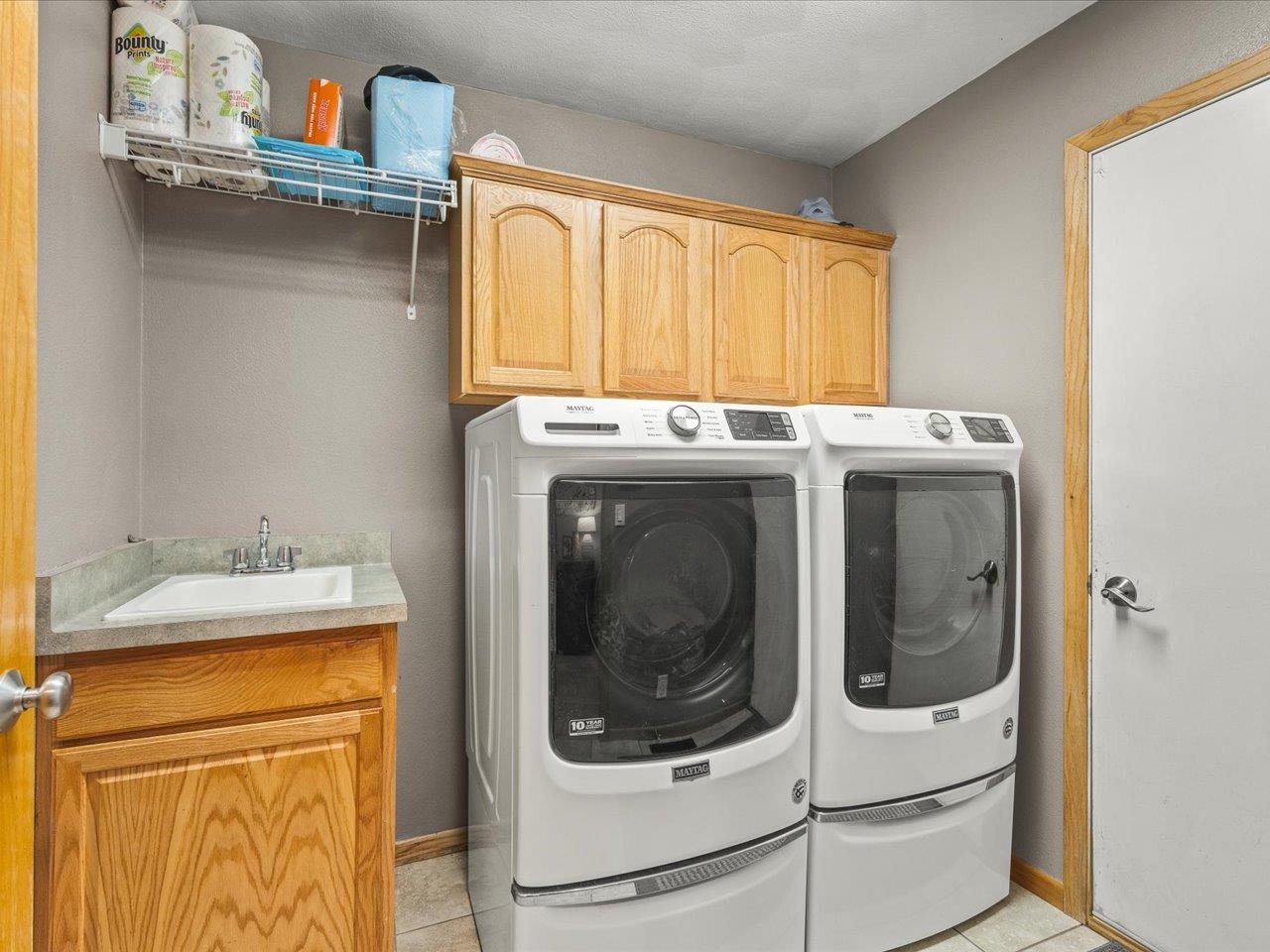 968 Falcon Point Place Rockton, IL 61072 - Photo 16 of 38 a utility room with dryer and washer