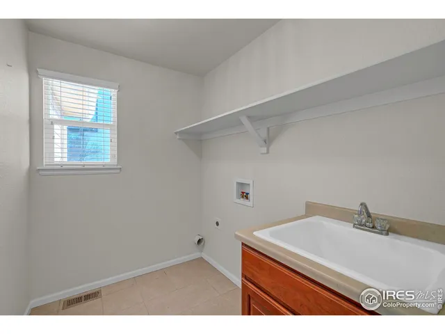 a bathroom with a sink and vanity