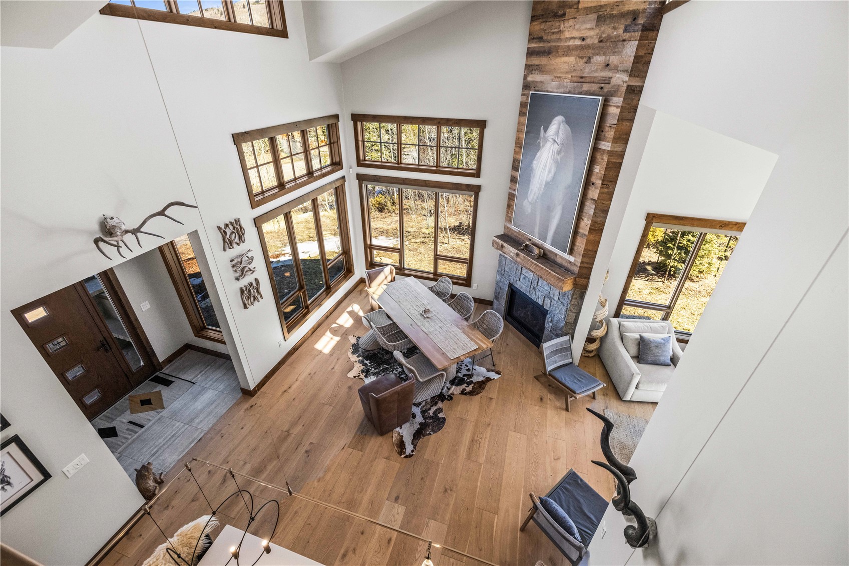 230 Game Trail Road Silverthorne, CO 80498 - Photo 33 of 43 wooden floor with windows and white walls