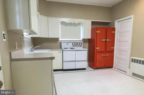 a utility room with washer and dryer
