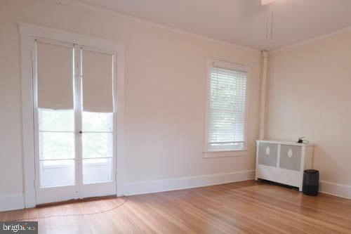 2504 Queen Anne Road Baltimore, MD 21216 - Photo 17 of 36 a view of an empty room and window