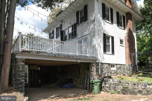 2504 Queen Anne Road Baltimore, MD 21216 - Photo 33 of 36 a front view of a house with a balcony