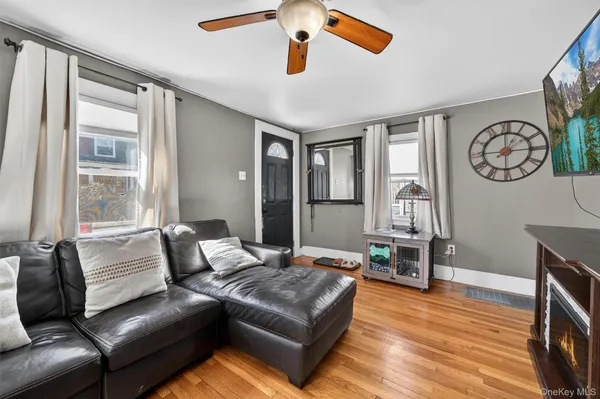 a living room with furniture and a window