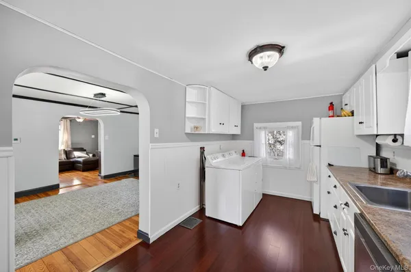 a room with furniture and wooden floor