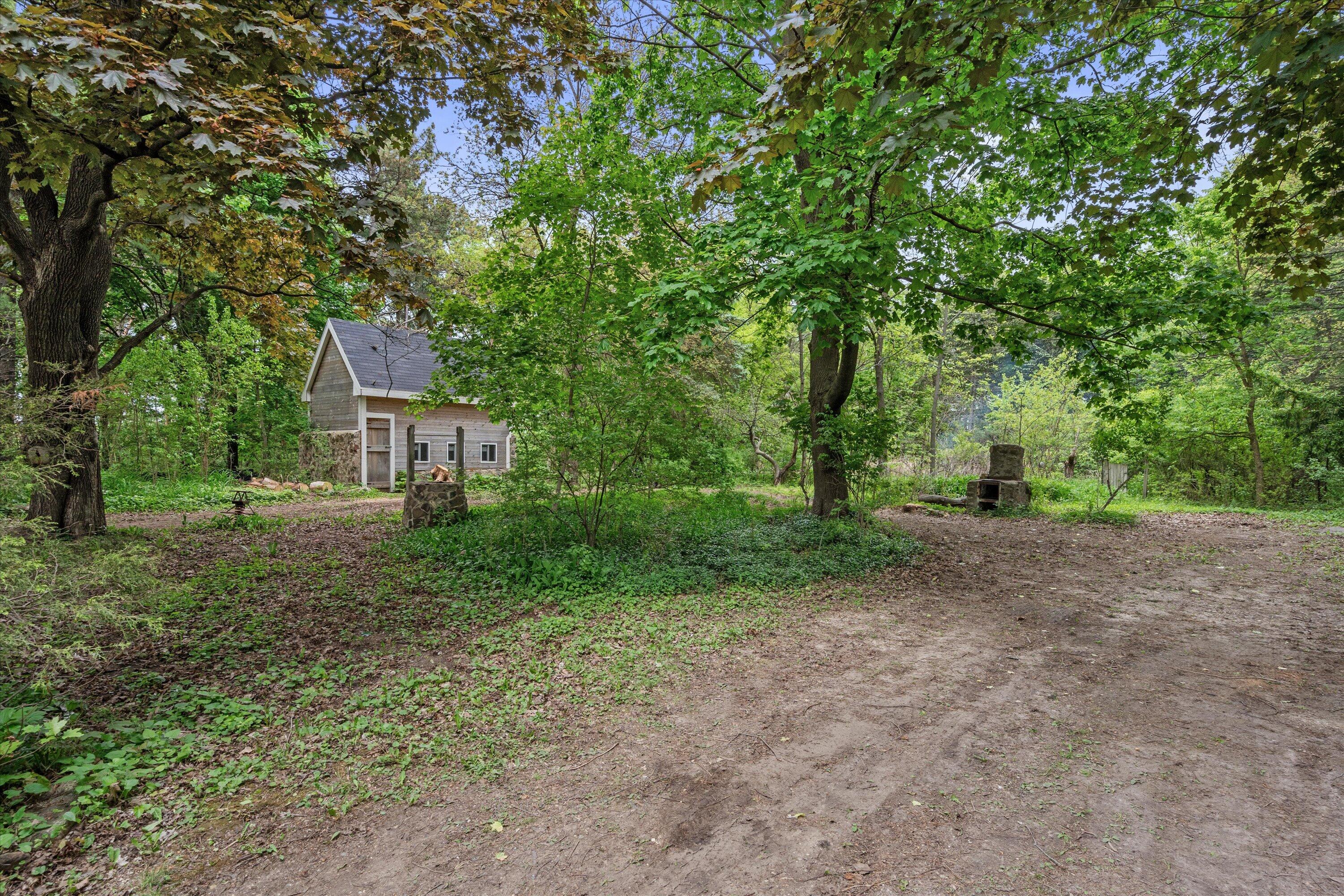 W330-s7098 County Road East Mukwonago, WI 53149 - Photo 48 of 60 Walking/Driving Path + Shed