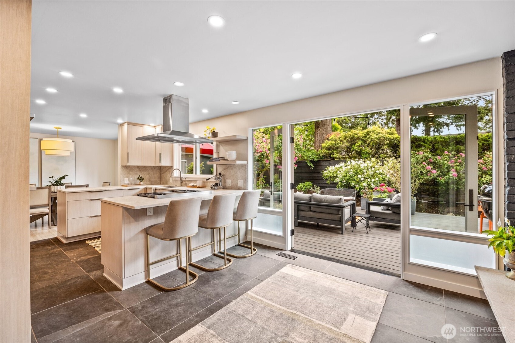 13526 Northshire Road Northwest Seattle, WA 98177 - Photo 14 of 40 a large kitchen with a table and chairs in it