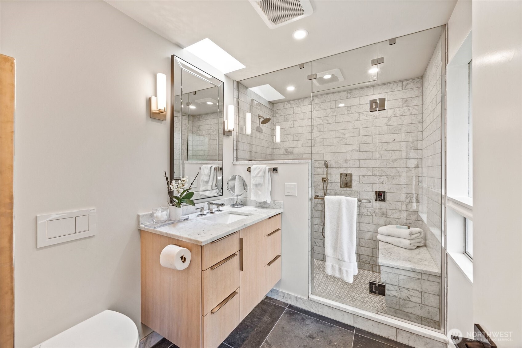 13526 Northshire Road Northwest Seattle, WA 98177 - Photo 19 of 40 a bathroom with a sink a toilet and shower