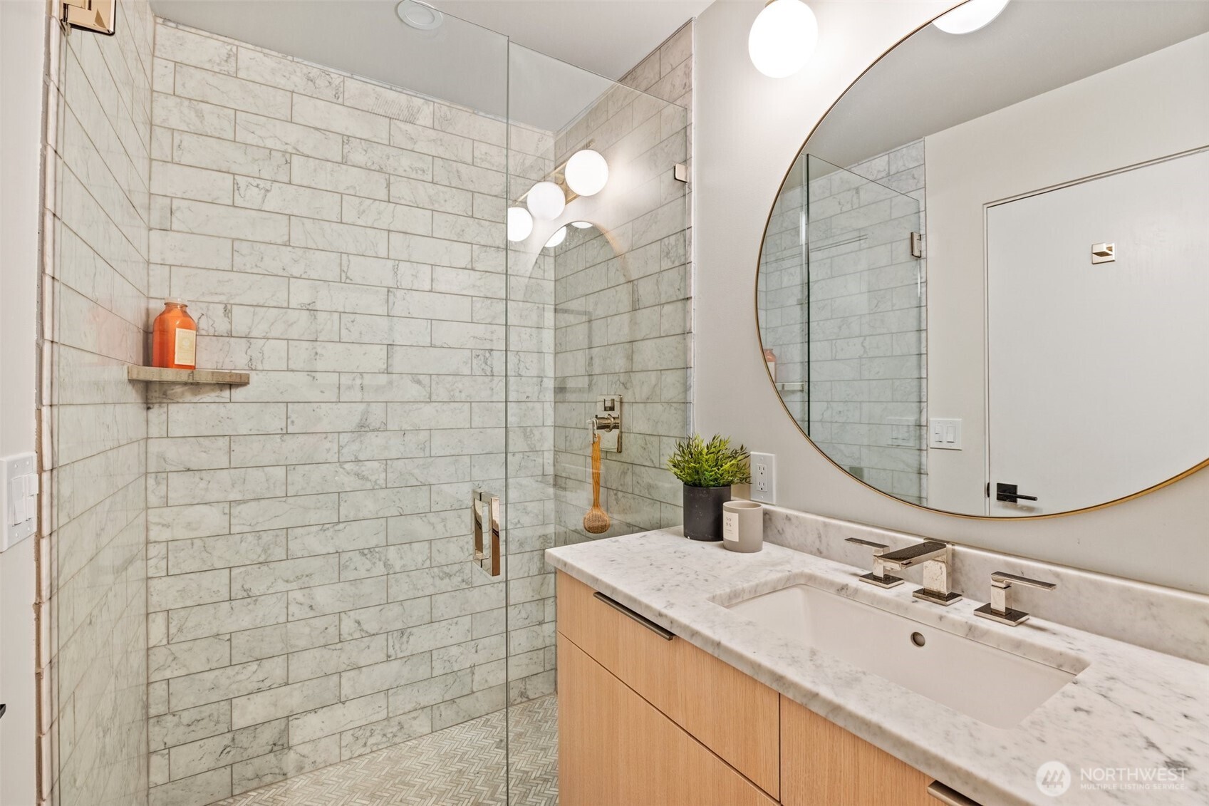 13526 Northshire Road Northwest Seattle, WA 98177 - Photo 21 of 40 a bathroom with a sink vanity and a mirror