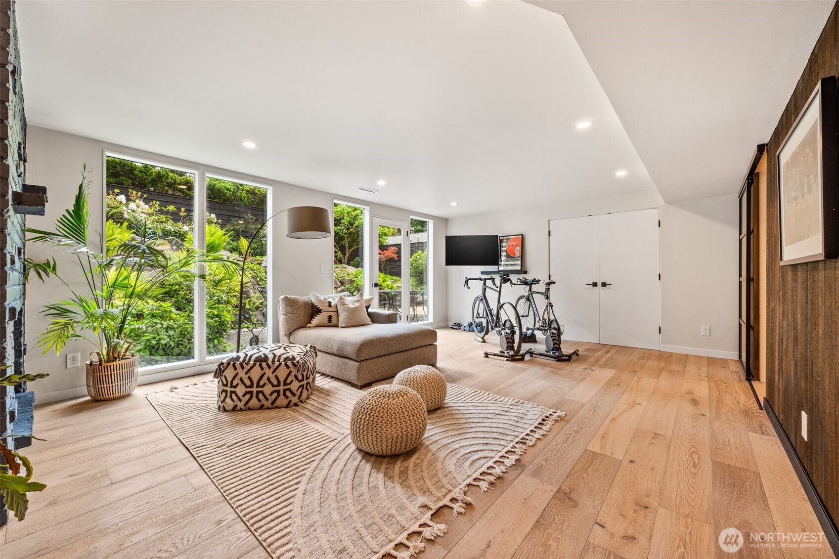 13526 Northshire Road Northwest Seattle, WA 98177 - Photo 23 of 40 a living room with furniture and a large window