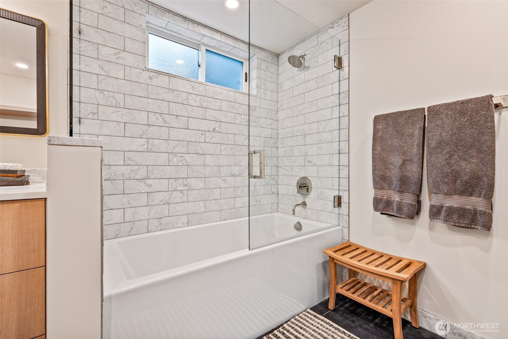 13526 Northshire Road Northwest Seattle, WA 98177 - Photo 28 of 40 a bathroom with a bathtub and a shower