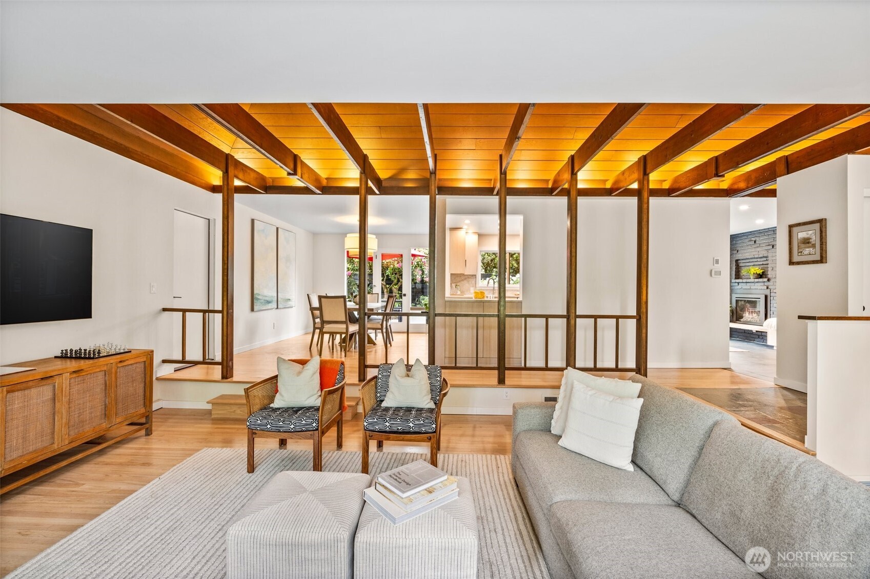 13526 Northshire Road Northwest Seattle, WA 98177 - Photo 6 of 40 a living room with furniture and a floor to ceiling window