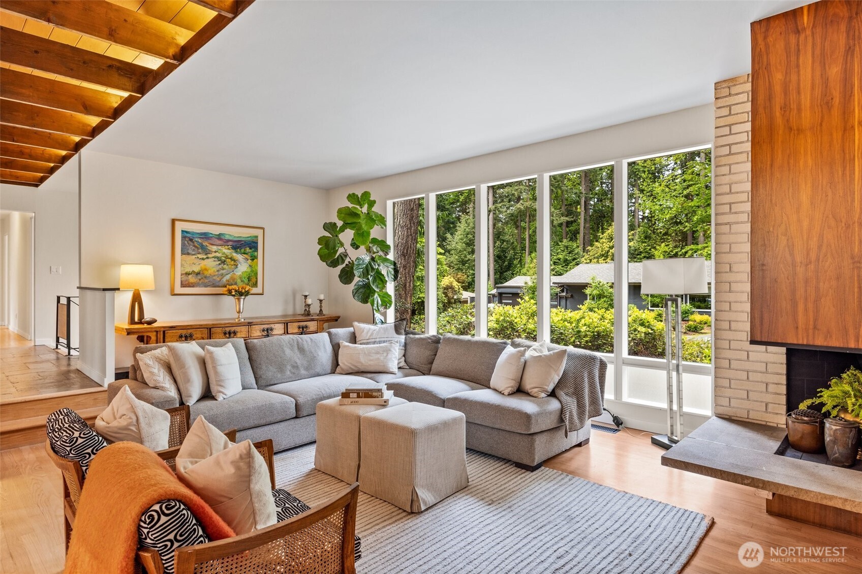 13526 Northshire Road Northwest Seattle, WA 98177 - Photo 8 of 40 a living room with furniture and a large window