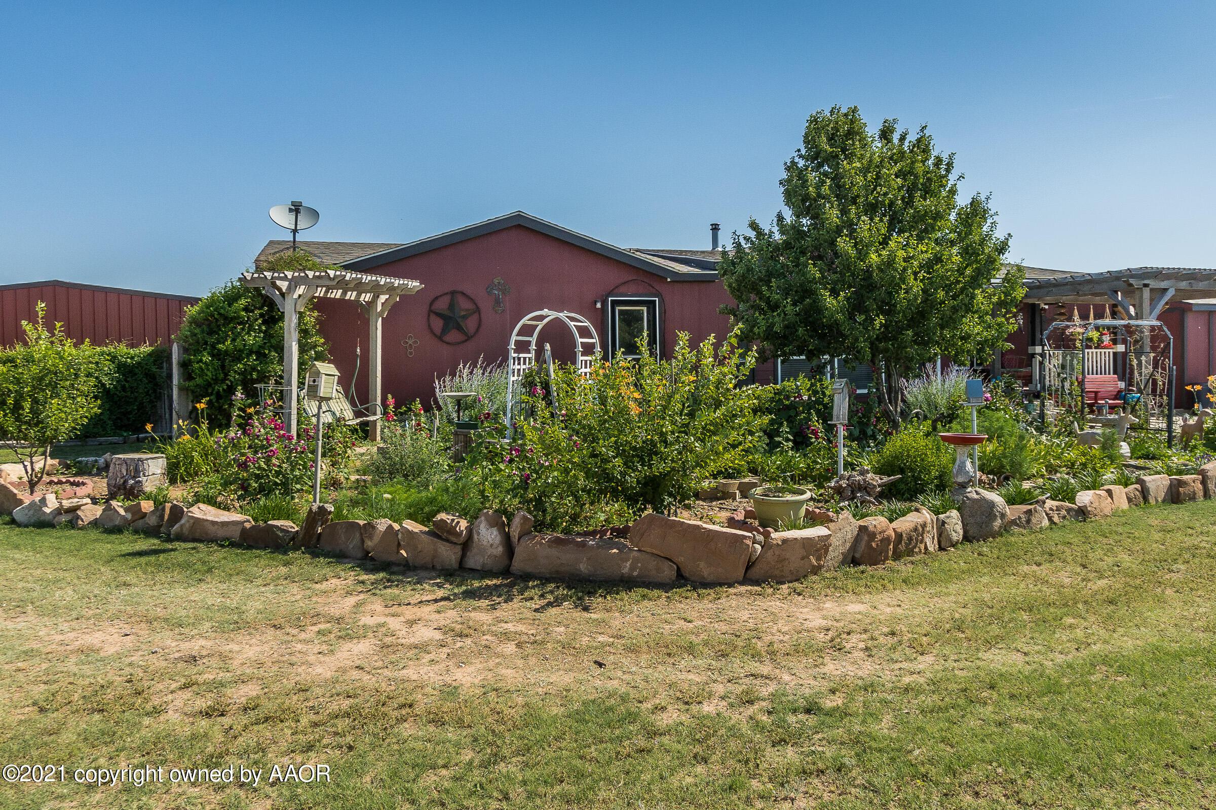 674 Plantation Road Amarillo, TX 79118 - Photo 5 of 35 005_Front Garden 2