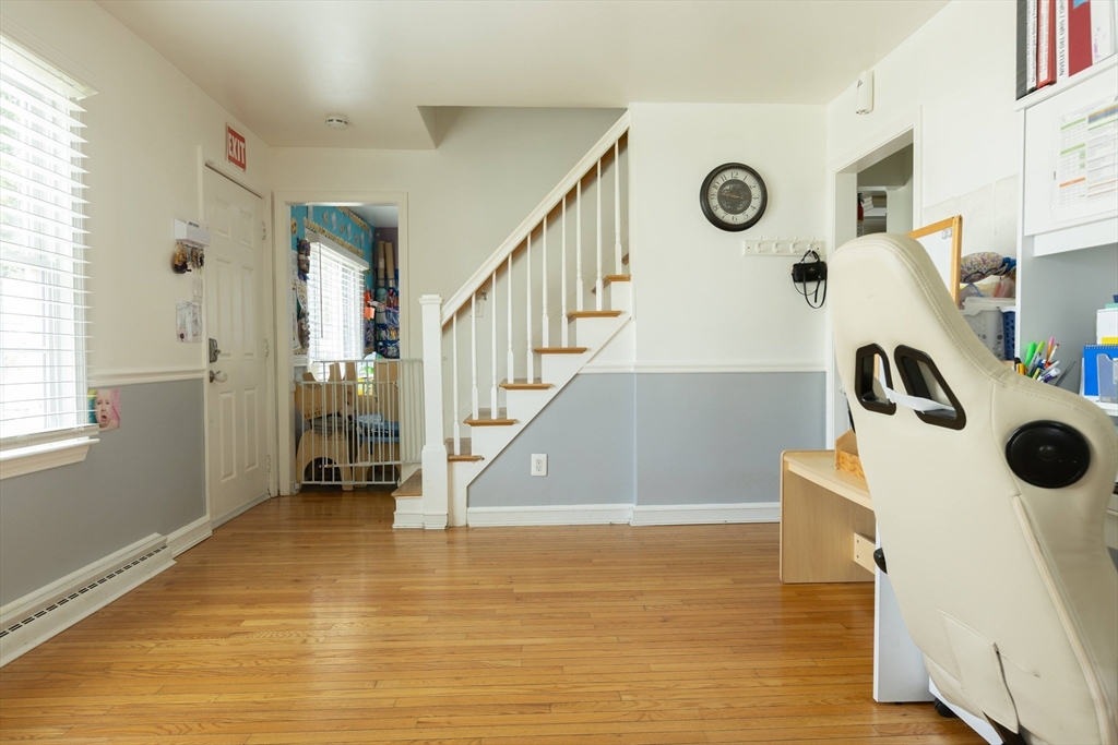 25 Beaconsfield Street Lawrence, MA 01843 - Photo 27 of 36 a view of entryway and hall with wooden floor