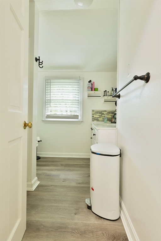 25 Beaconsfield Street Lawrence, MA 01843 - Photo 30 of 36 a room with a refrigerator and cabinets