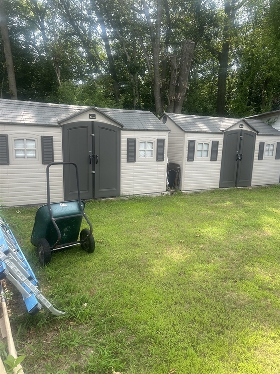 25 Beaconsfield Street Lawrence, MA 01843 - Photo 31 of 36 a view of a house with a yard