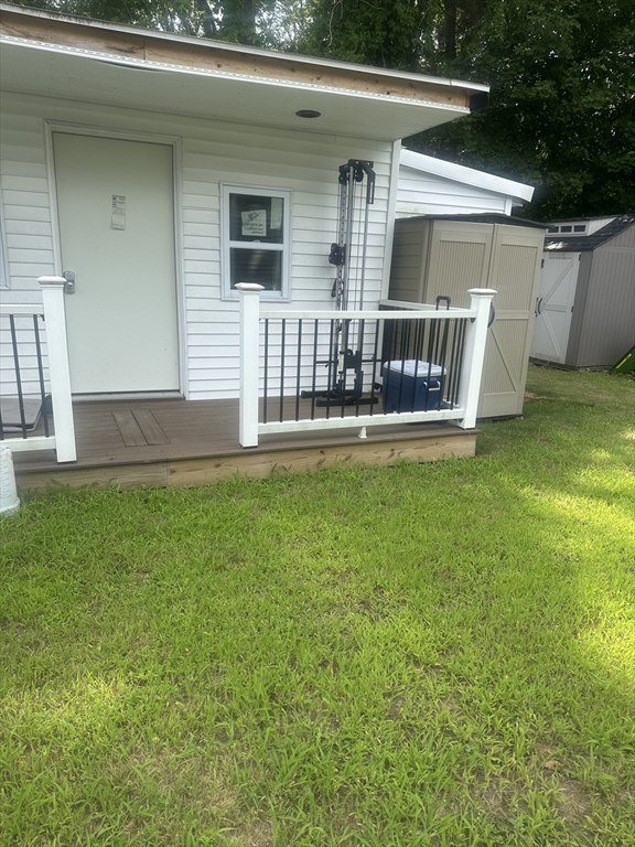 25 Beaconsfield Street Lawrence, MA 01843 - Photo 32 of 36 a view of house with backyard porch and entertaining space