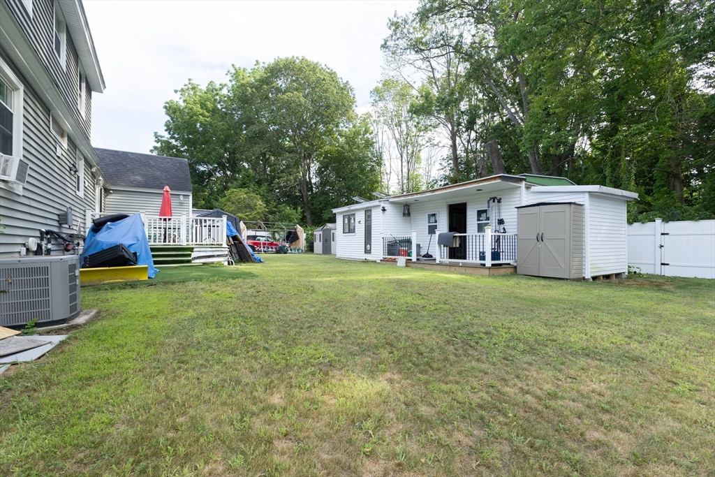 25 Beaconsfield Street Lawrence, MA 01843 - Photo 4 of 36 a view of house with backyard