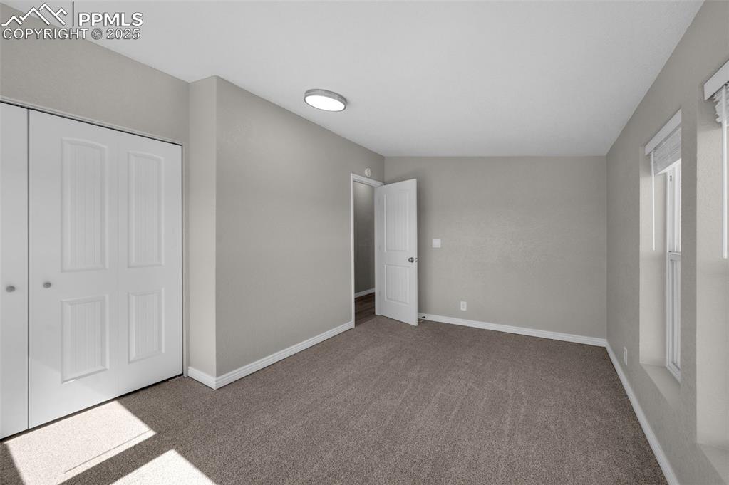 515 South Calhan Highway Yoder, CO 80864 - Photo 12 of 34 a view of an empty room and window