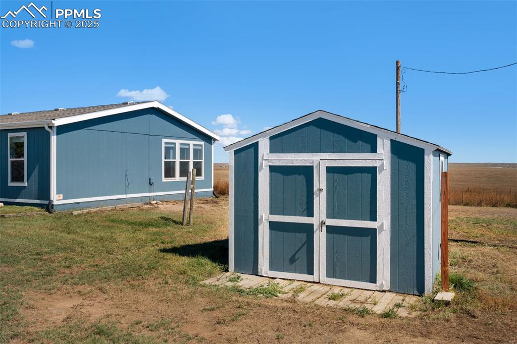 515 South Calhan Highway Yoder, CO 80864 - Photo 23 of 34 a house view with a outdoor space