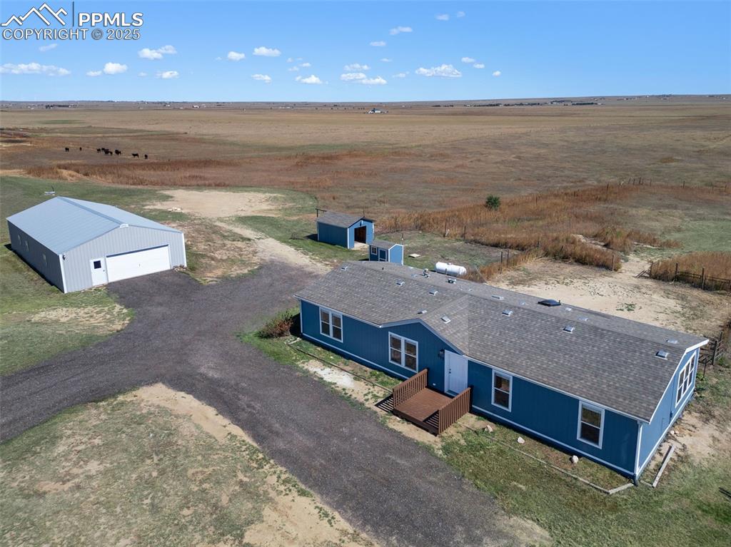 515 South Calhan Highway Yoder, CO 80864 - Photo 26 of 34 swimming pool with an ocean view