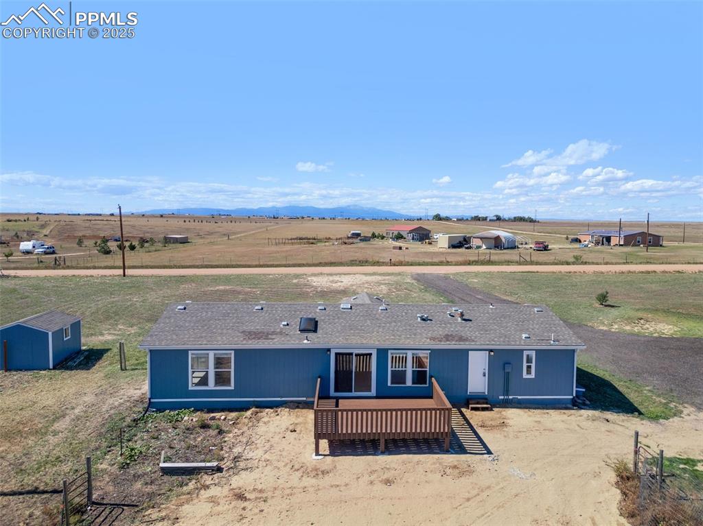 515 South Calhan Highway Yoder, CO 80864 - Photo 28 of 34 a view of a terrace with wooden floor and city view