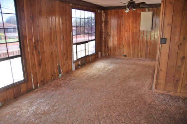 4875 Moi Road Hanapepe, HI 96716 - Photo 24 of 25 an empty room with windows stairs and front door