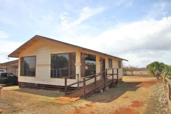 4875 Moi Road Hanapepe, HI 96716 - Photo 4 of 25 a view of a house with a wooden fence