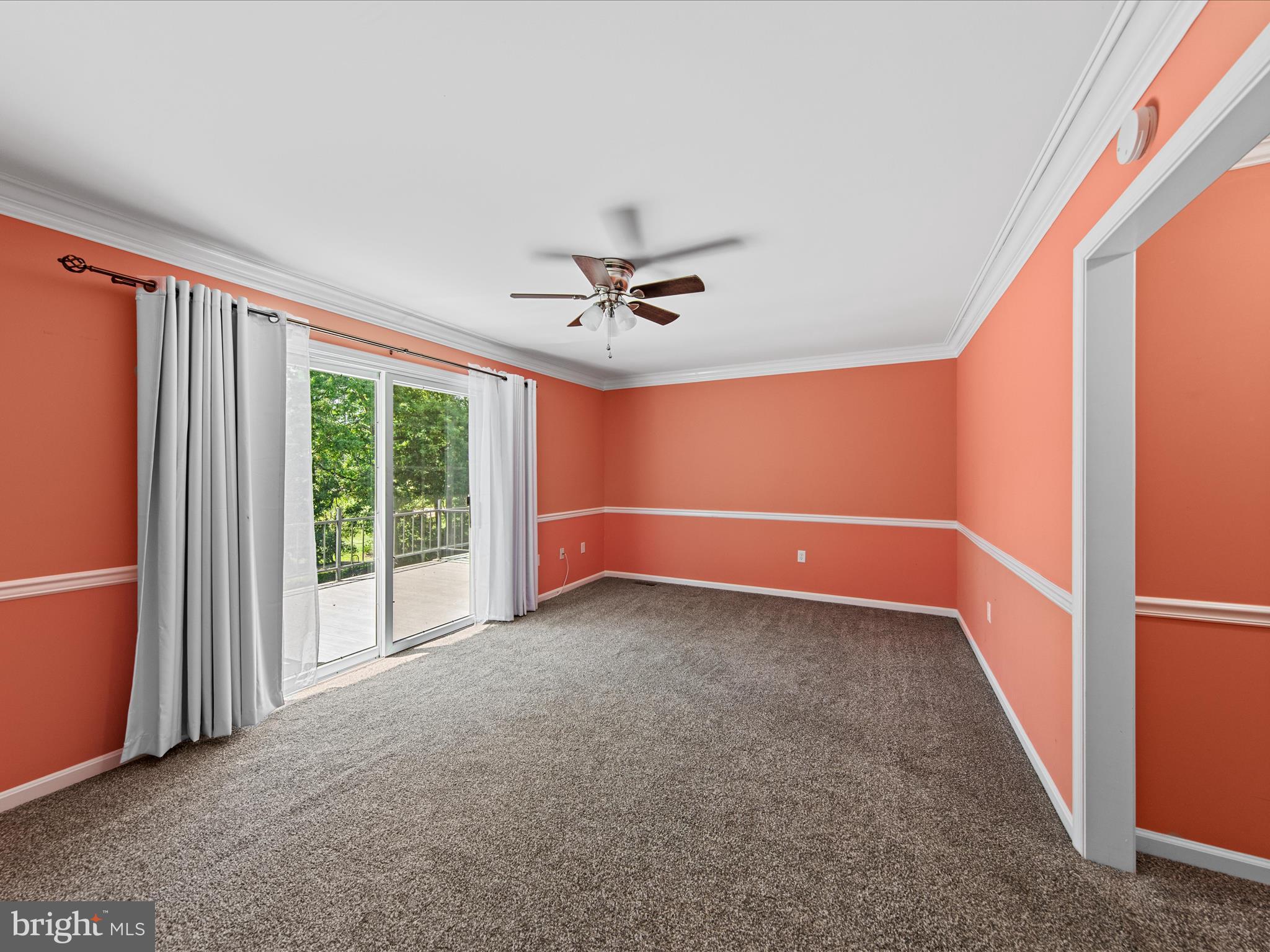 24345 Widgeon Place, Unit 29 St. Michaels, MD 21663 - Photo 22 of 38 a view of a livingroom with a ceiling fan and window