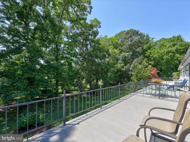 a view of a balcony with chairs