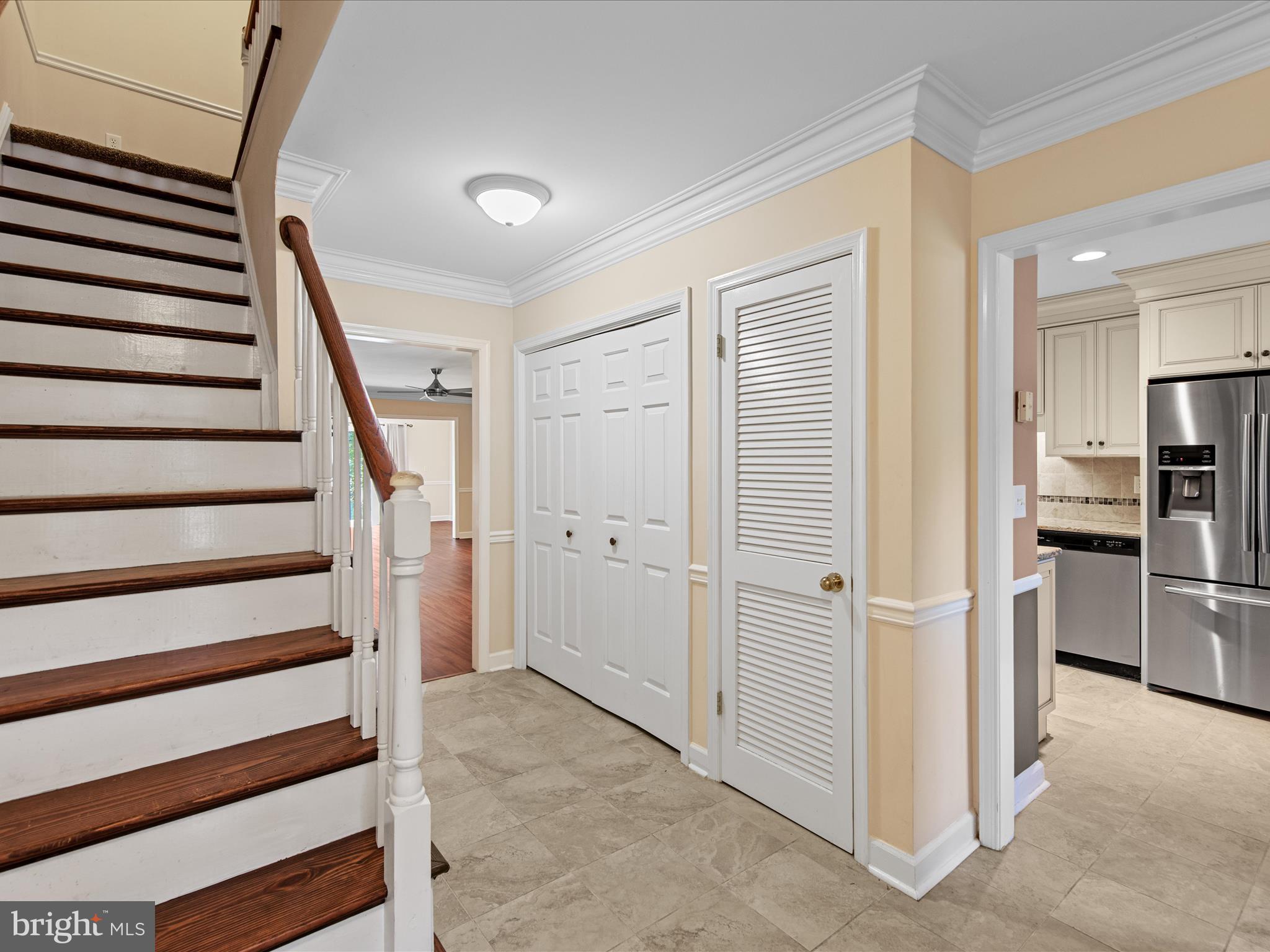 24345 Widgeon Place, Unit 29 St. Michaels, MD 21663 - Photo 6 of 38 a view of a hallway with kitchen and entryway