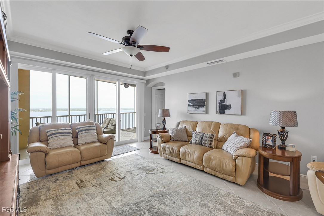 2743 First Street, Unit 1502 Fort Myers, FL 33916 - Photo 15 of 35 a living room with furniture and a large window