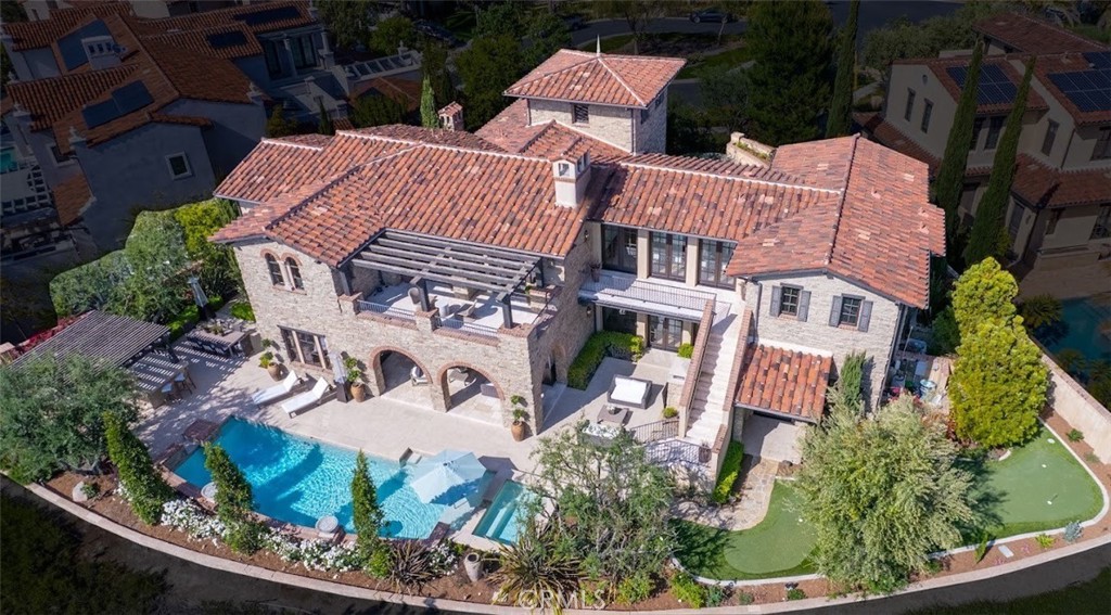 4 Thomas Road Ladera Ranch, CA 92694 - Photo 2 of 4 an aerial view of a house with a garden