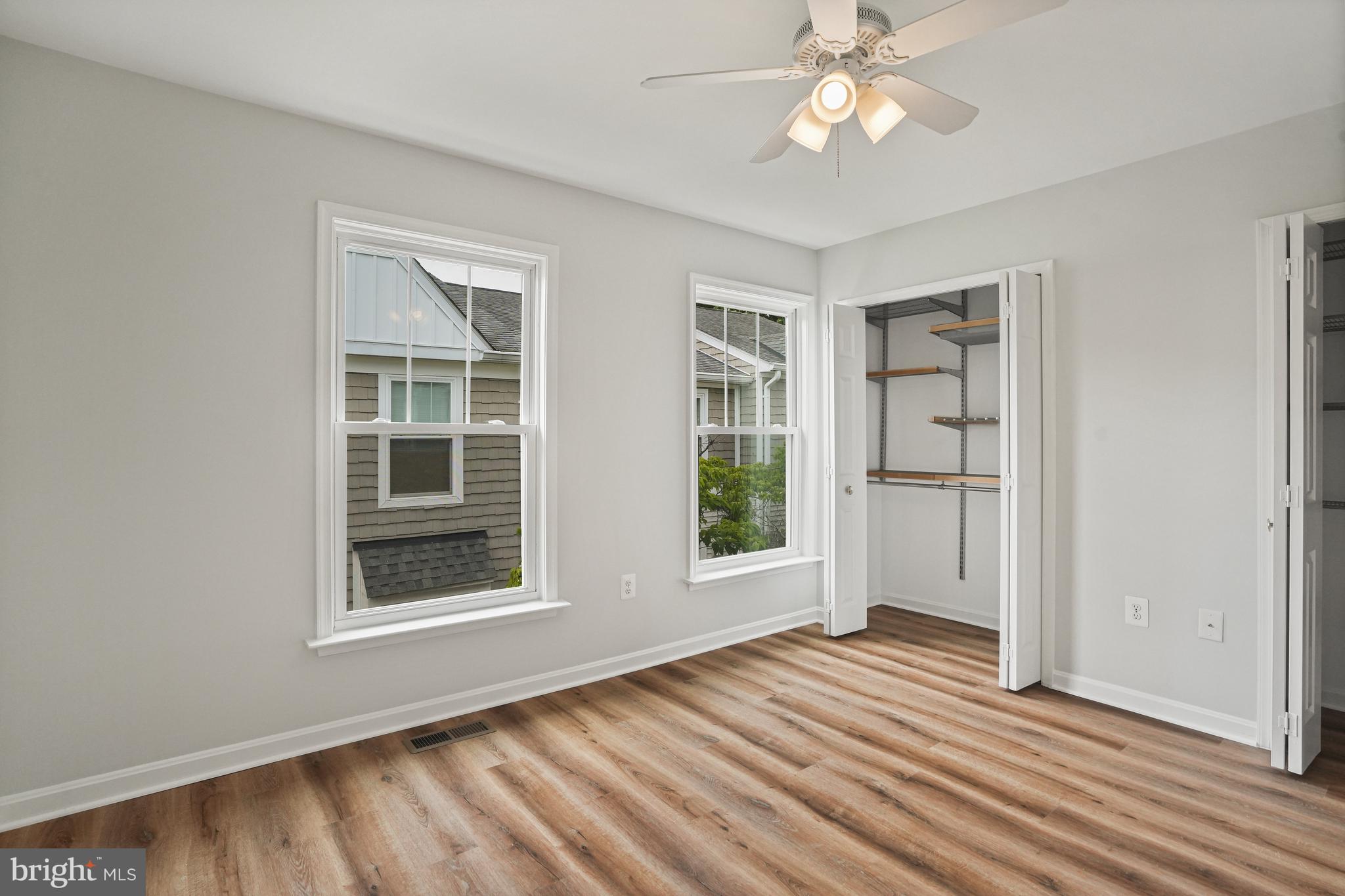 3823 9th Road South Arlington, VA 22204 - Photo 11 of 40 a view of an empty room with a window and wooden floor